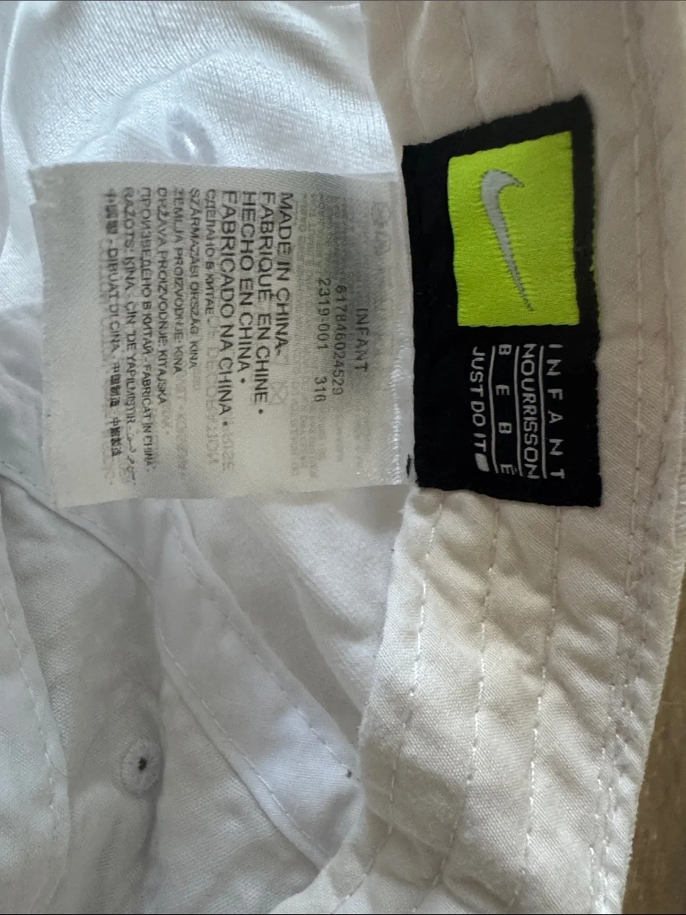 Nike infant Kids White Baseball Hat with Black embroidered Swoosh Logo